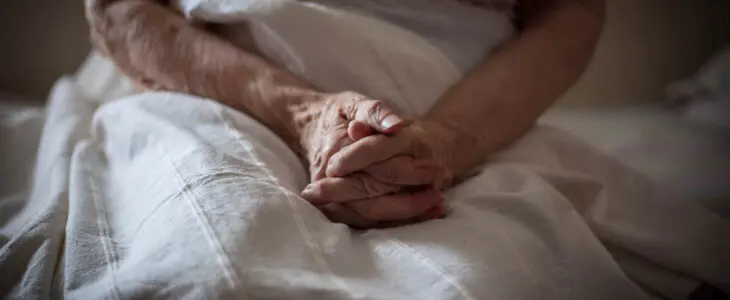 Close up of old woman hands.