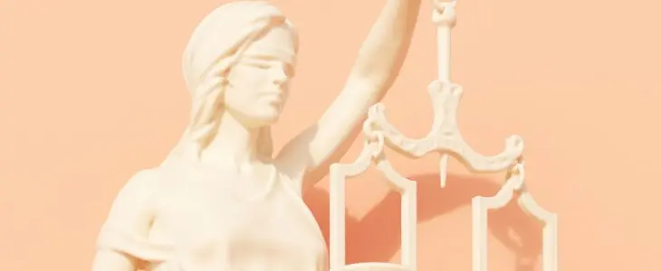 statue of lady justice holding scales of justice